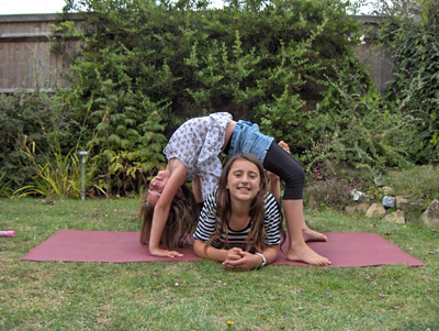 image of children doing yoga